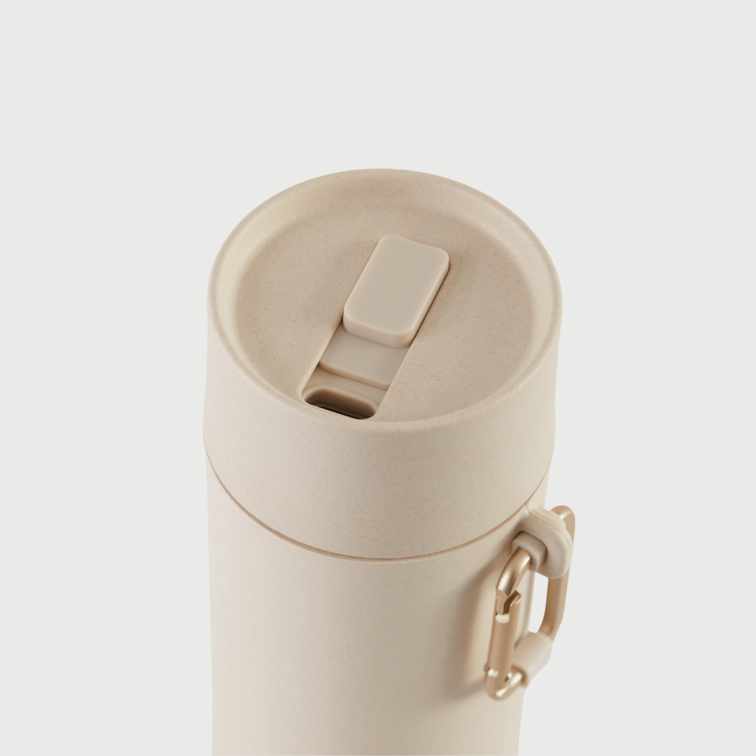 Slide to lock mouthpiece shown on S'wheat reusable bottle in oat